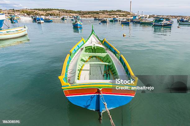Kajjik Boat At Marsaxlokk Harbor In Malta Stock Photo - Download Image Now - 2018, Archipelago, Blue