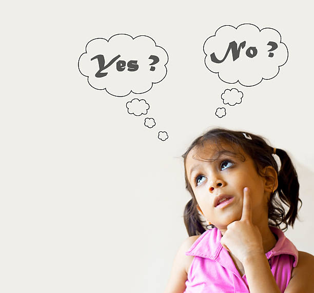 istock Girl with yes or no thought bubbles 186308779