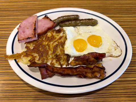 vegetarian english breakfast dish top view with baked bean and egg