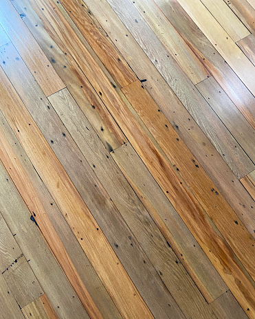 Reclaimed Rimu solid timber floorboards sanded and finished with oil.
