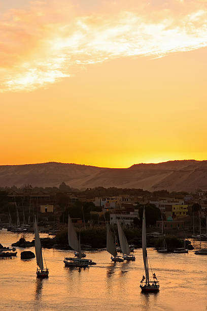 istock Felucca boats sailing on the Nile river at sunset, Aswan 186312700