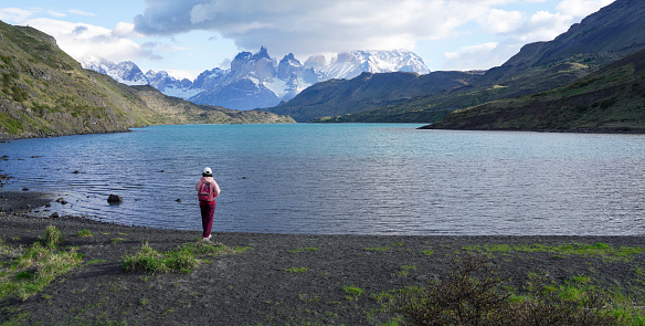 Woman hiking in Torres del Paine National Park，Chile