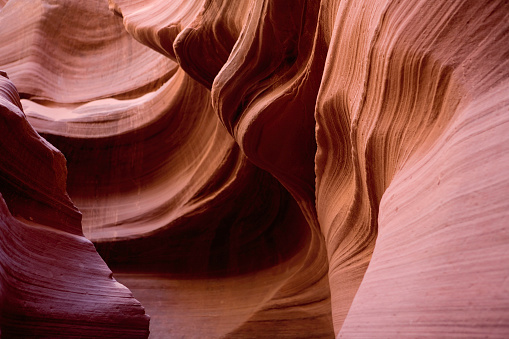 Antelope Canyon is the most famous slot canyon in the world. It is shaped by millions of wind and water erosion.  It is one of the most stunning natural wonders in the United States and a popular destination for tourists who love hiking, photography  and taking in the unique and other worldly nature of the canyons.