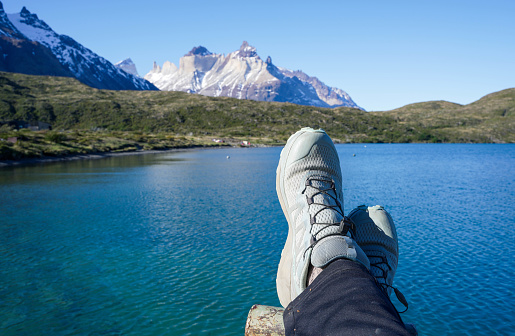 A man hikes in Torres del Paine National Park