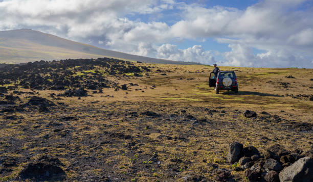 istock Man traveling by car in Easter Island, Chile 1863135248