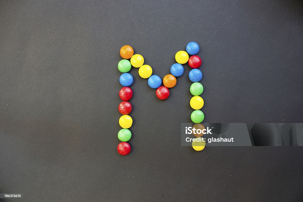 The Letter M The Letter M made from sweeties. Alphabet Stock Photo