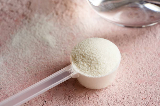 istock Collagen powder in a plastic measuring scoop 1863140987