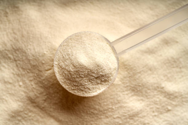 istock Collagen powder in a plastic measuring cup 1863142018