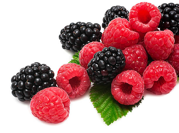 istock blackberry and raspberry on the white isolated background 186317898