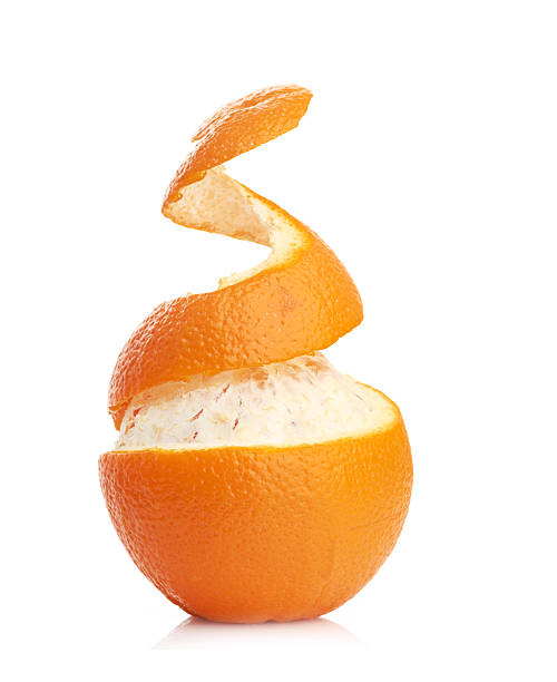 istock orange with peeled spiral skin 186319752