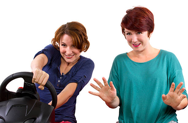 istock Two young female driving on a road trip 186320195