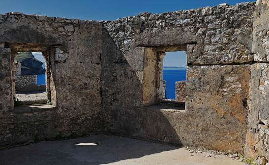 Windows in the remains of a a garrison building, Ali Pasha of Tepelene stronghold upper terrace, Porto Palermo bay. Himare-Albania-136+