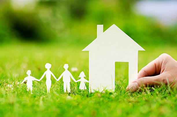 istock House of paper in hand 186320358