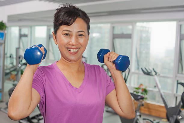 istock Woman standing in the gym 186320578