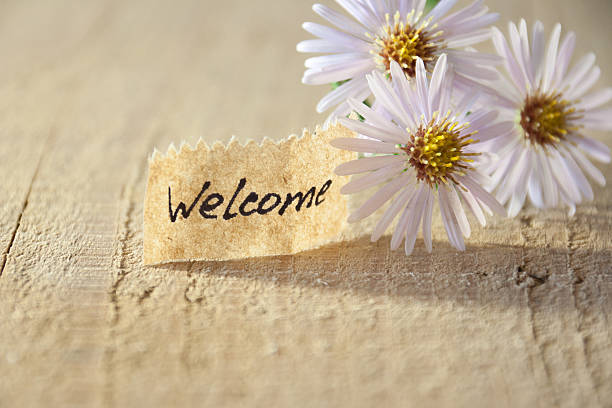 istock banner with welcome and  blossoms 186322929