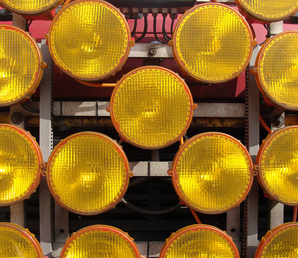 istock multiple yellow headlights on an industrial truck 186323164