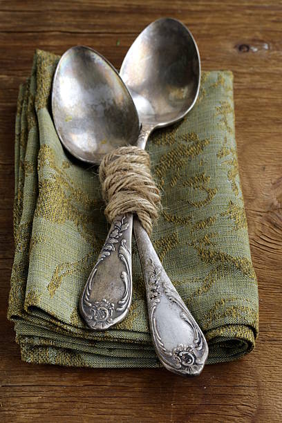 istock vintage silver cutlery on a wooden background 186323168