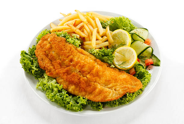 istock Fried cod, French fries and vegetables 186323603
