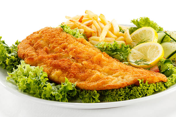 istock Fried cod, French fries and vegetables 186323623