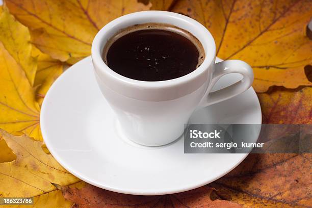 Cup Of Coffee On Autumn Leaves Background Stock Photo - Download Image Now - Autumn, Backgrounds, Black Color