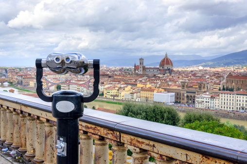 Touristic binoculars and view of Florence