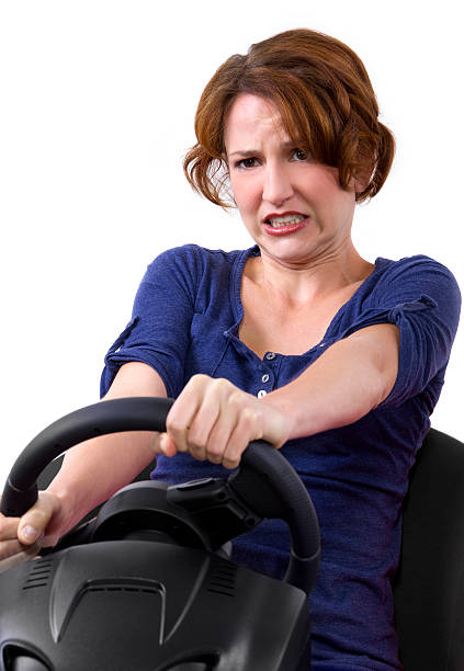 istock Young female driver on a white background 186324375