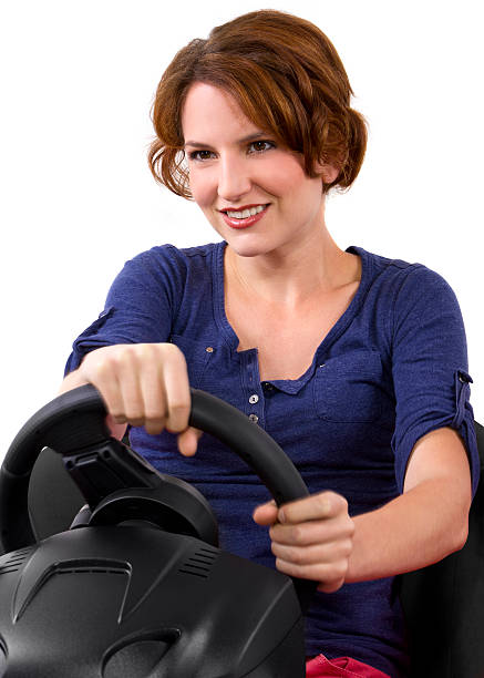 istock Young female driver on a white background 186324379