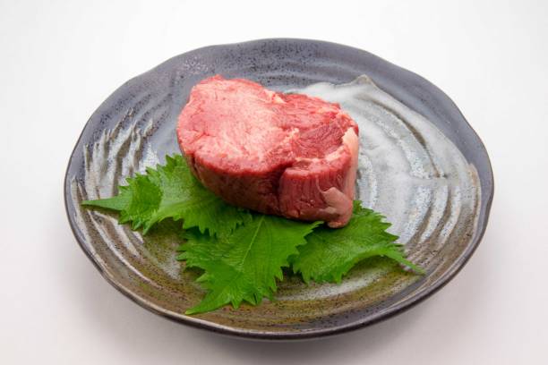 istock Thickly sliced raw beef tongue 1863249491