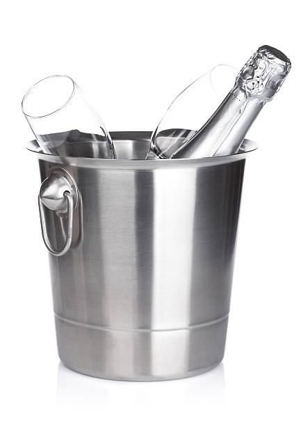 istock Champagne bottle in bucket and empty glasses 186325928