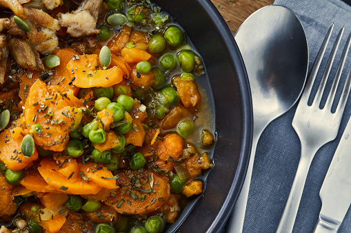 close up of corn, carrot and beans in a bowl