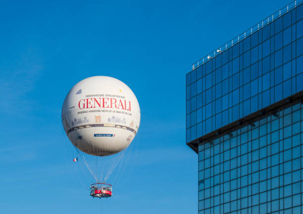 The Paris Generali Balloon Paris, France - 12 17 2023 : The Paris Generali Balloon, a tethered balloon, serving as a tourist attraction and air quality awareness tool in André Citroen Park weather balloon stock pictures, royalty-free photos & images