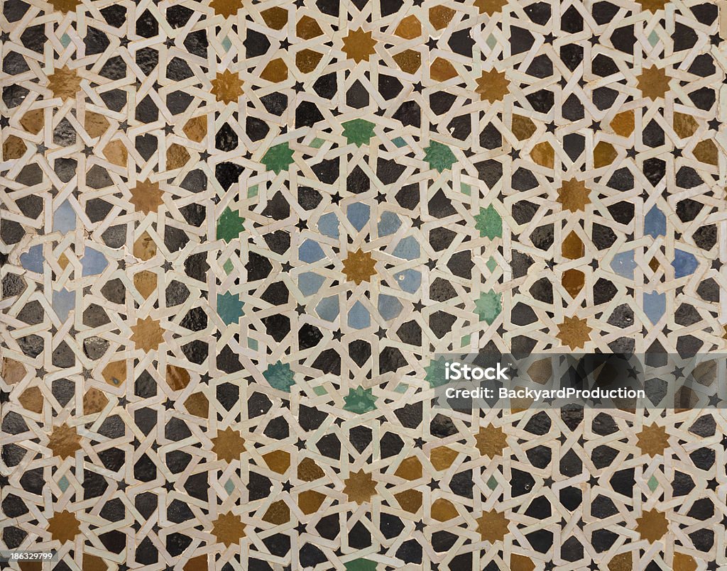 Pattern of arabic tiling or mosaic Oriental pattern mosaic of tiles in a mosque in Morocco forming concentric circles Abstract Stock Photo