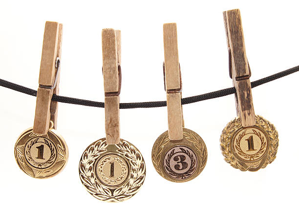 istock medal, clothespin and rope on a white background 186330477