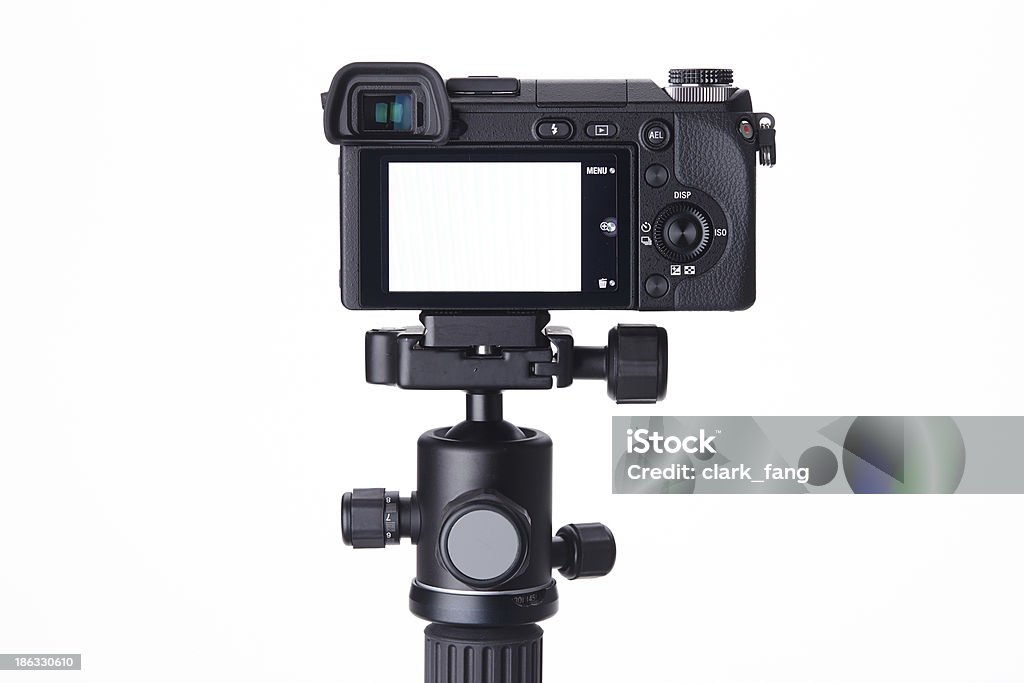 Compact digital camera on mini tripod Camera - Photographic Equipment Stock Photo