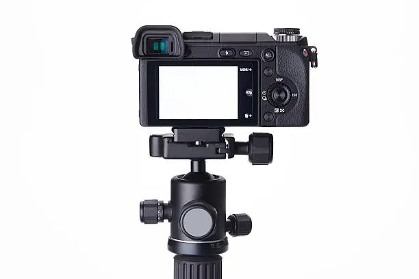 Photo of Compact digital camera on mini tripod