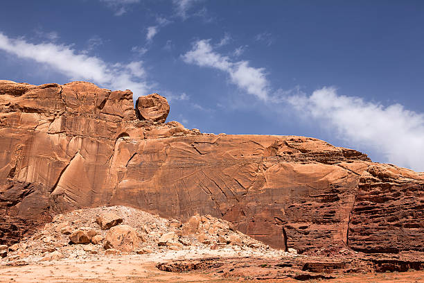 istock Wadi Rum mountain with unusual rolling stone on it 186330969