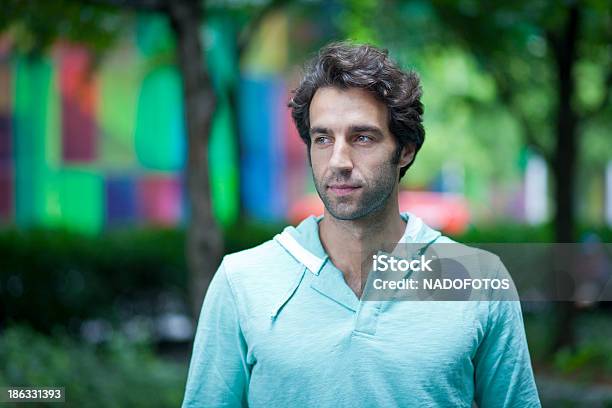 Worried Man Walking In The Park Stock Photo - Download Image Now - 30-39 Years, 40-49 Years, Adult