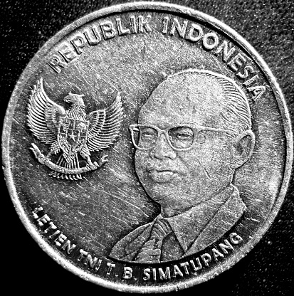 Bandung, Indonesia - December 16, 2023: Indonesian currency coins, 500 rupiah