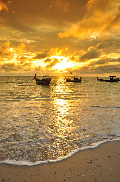 istock Fishing Boat with sunset and sky 186332985