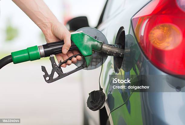 Man Pumping Gasoline Fuel In Car At Gas Station Stock Photo - Download Image Now - Adult, Business, Car