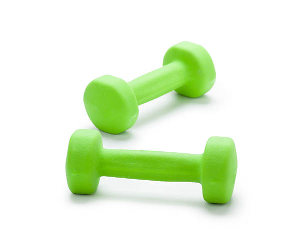 istock small green dumbbells,  isolated in white 186334708