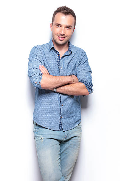 istock casual man with crossed arms 186335123