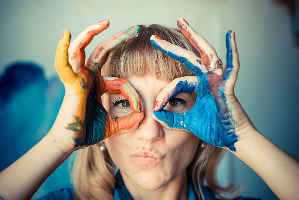 istock beautiful blonde woman painter 186336712