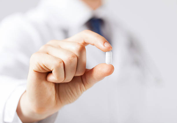 istock doctor with pill in hospital 186337162