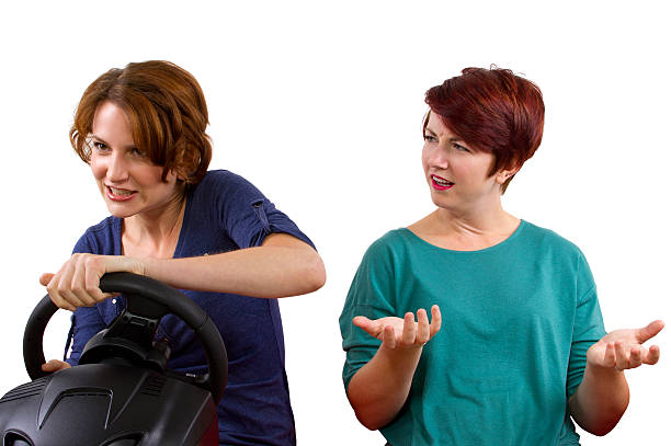 istock Annoying female passenger by being a backseat driver 186337359