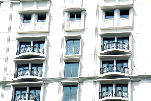 Facade of new modern residential apartment house building. Including place for copy space