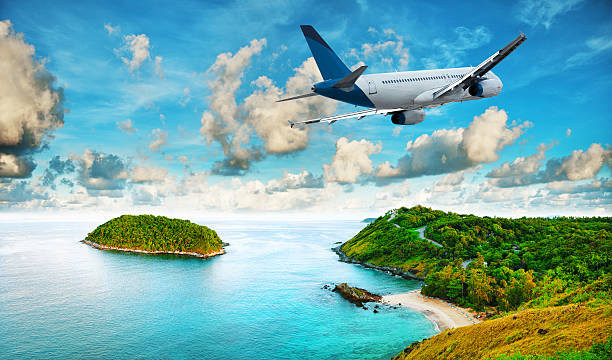 istock Jet is over the tropical resort 186341390