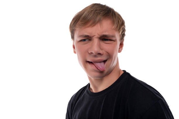 istock Blond teenager boy makes a grimace 1863414657