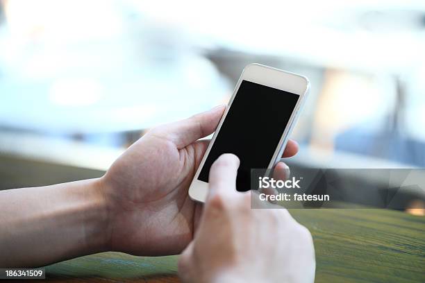 Touching Smart Phone Stock Photo - Download Image Now - Accessibility, Adult, Adults Only