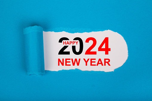 Torn Paper With Happy New Year 2024 On White Background